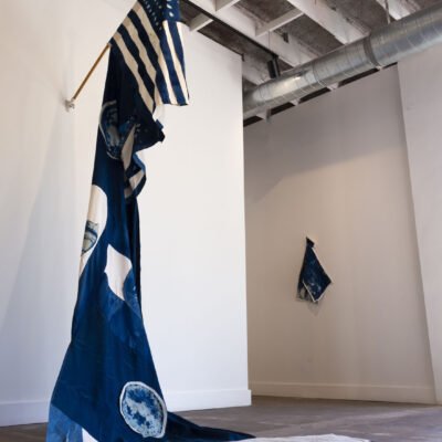 Alexandra Robinson, De Donde Soy (where I'm from), 2019 cyanotype on cotton muslin, cotton muslin, and flag holder