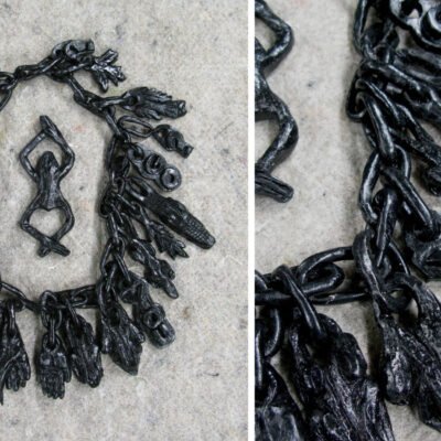 black necklace sculpture