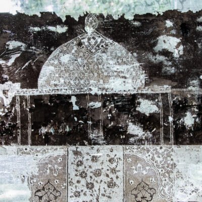 close up of white sheet, buildings are drawn with lace pattern.