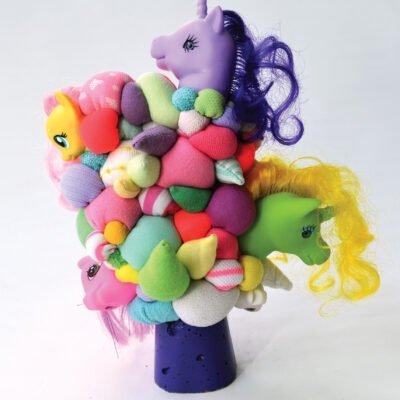 soft sculpture of My Little Pony doll heads and colorful fabric sewn together titled My Little Biomorphic Pony, by April Garcia