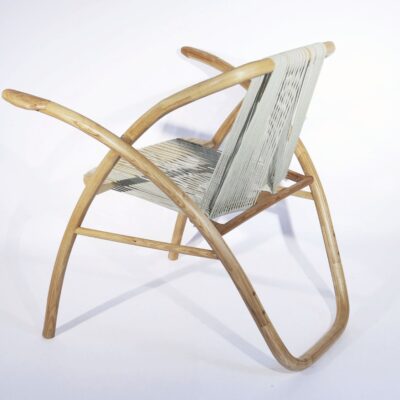 Continuity Chair made from ash wood, featuring soft and curved shapes, designed by Brianna McIntyre