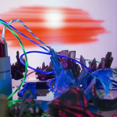 close up of Recharge (ClickfarmCrystalGrid) composed of video sculpture, wires, and 3D resin prints