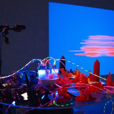 gallery view of Recharge (ClickfarmCrystalGrid) composed of video sculpture, wires, and 3D resin prints