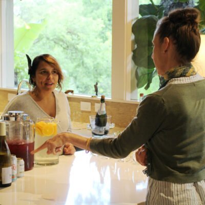 Photo of two women talking over refreshments