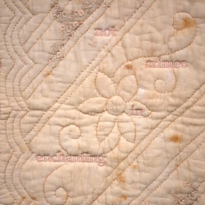 peach colored quilt with 