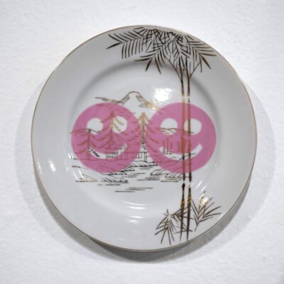 fine china paint with two pink smiley faces painted on